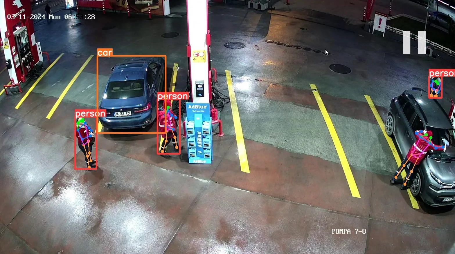 Monitoring simultaneous service at several pumps and vehicle traffic at a station at night